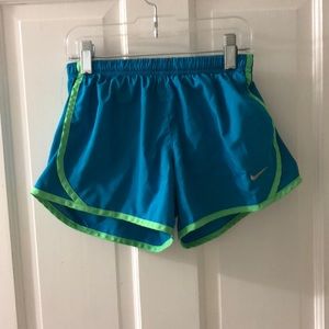 Blue and green child’s athletic shorts